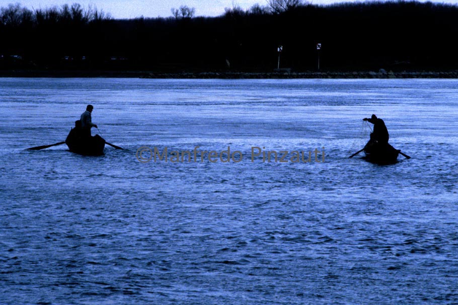 13 Danube ' s Delta . Fishing on Sulina Arm